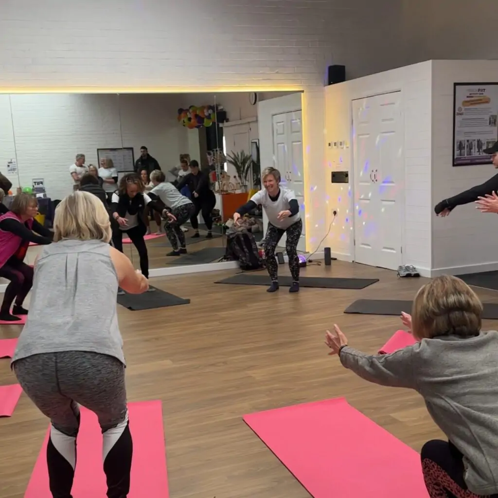 Ladies fitness class at MissionFIIT Activity Hub with instructor