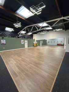 Spacious empty hall for hire in Hailsham with wooden flooring suitable for events and dance