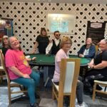 Friends celebrating escaping the High Stakes Heist.