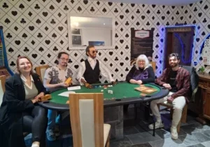 Group playing casino themed escape room game